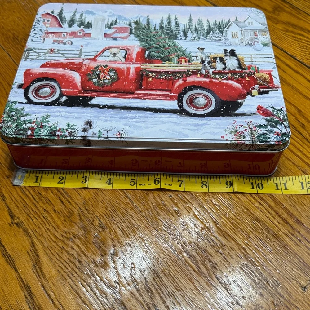 Christmas Scene 300 piece puzzle in a collector tin.  Originally a cookie tin.